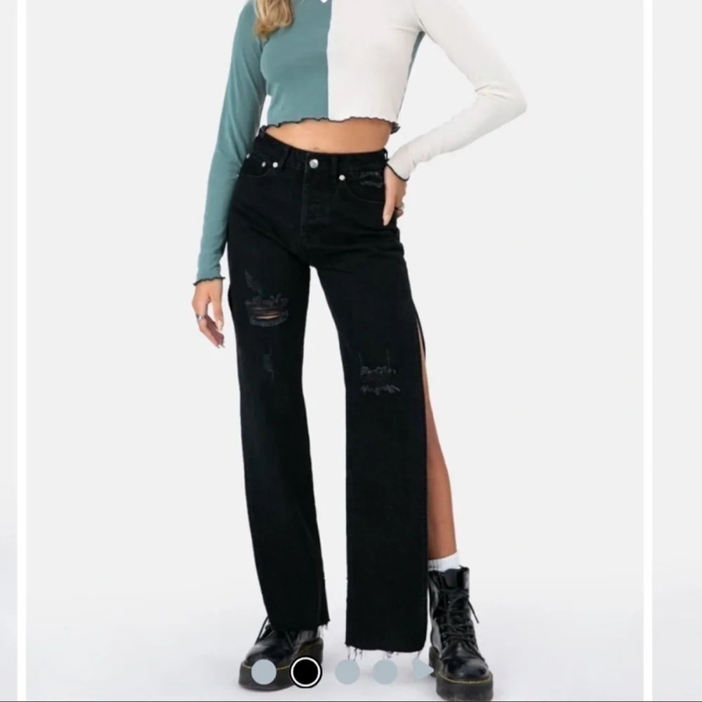 ADIKA Voodoo Side Slit Distressed Jeans Button Fly Closure